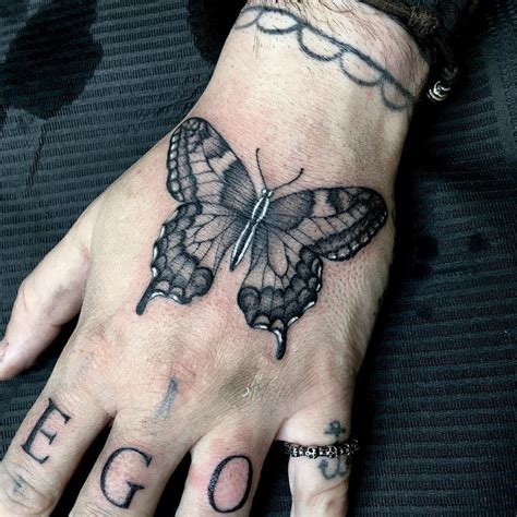 butterfly tattoo on hand|47 Stunning Butterfly Tattoo Designs to Inspire Your Next Ink